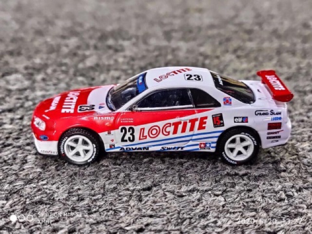 Xe Mô Hình Nissan Skyline GT-R (BNR34) 1999 1:64 GreenLight ( Trắng Đỏ )