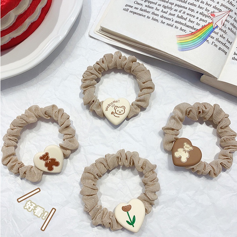 Thun cột tóc dễ thương cho nữ