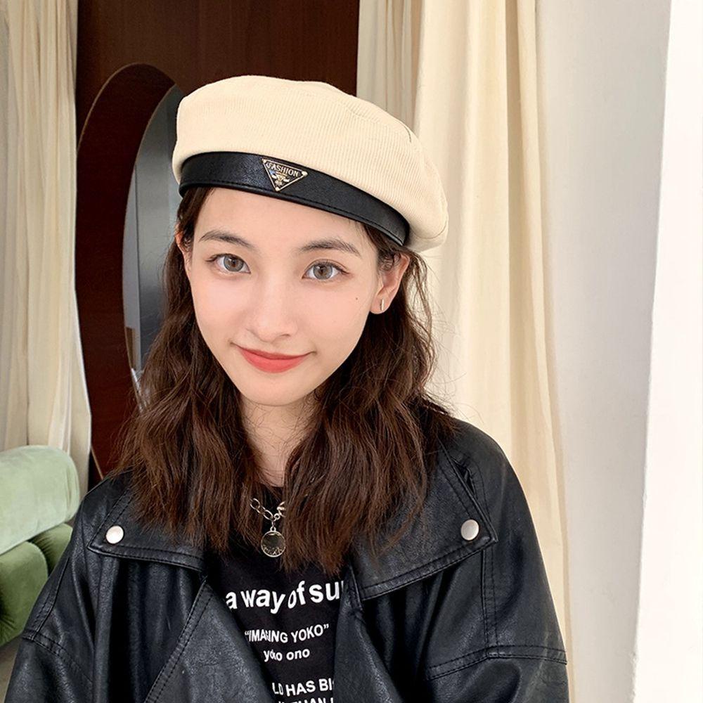 Mũ Beret Da Màu Trơn Đính Logo Kim Loại Hình Tam Giác Phong Cách Anh Quốc Thời Trang Mùa Đông Cho Nữ
