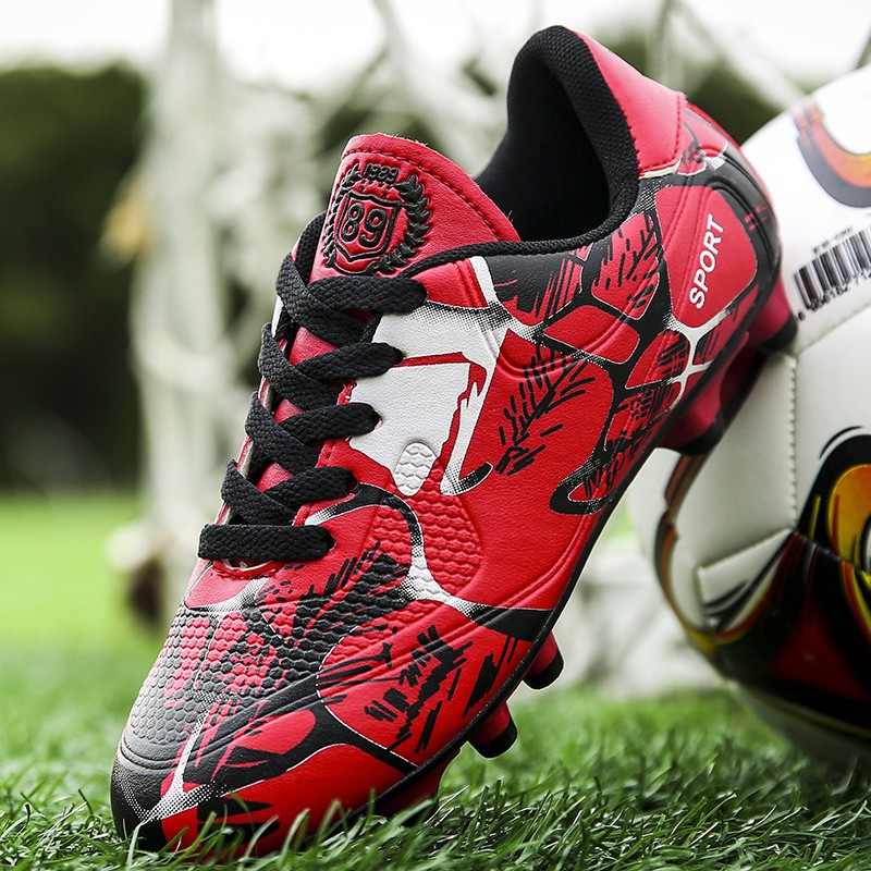Giày đá bóng trên sân cỏ nhân tạo cho người lớn và trẻ em