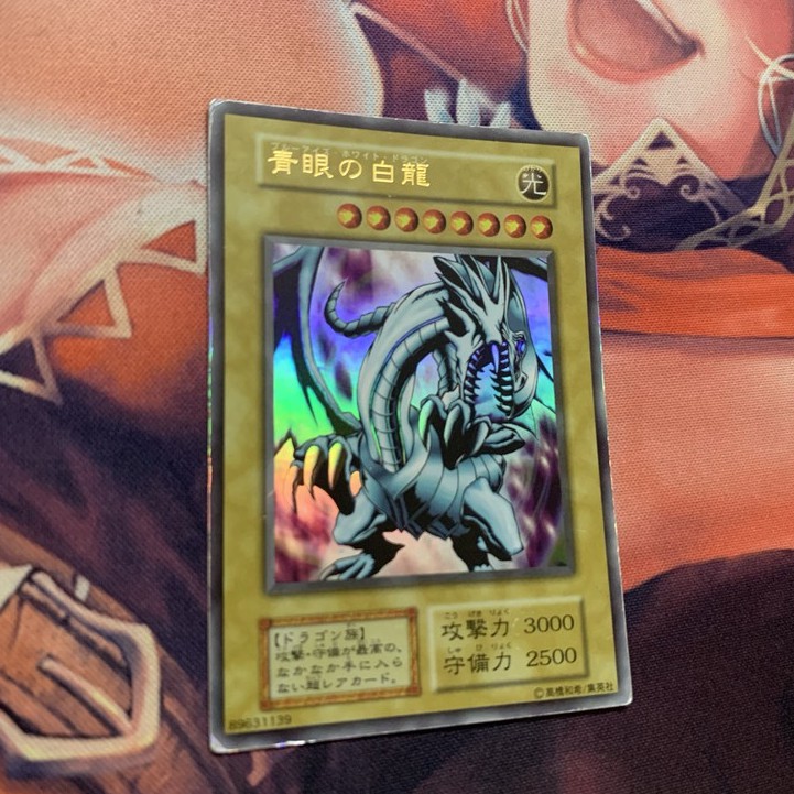 Lá bài Yu-Gi-Oh! Chính hãng Blue-Eyes White Dragon (Rồng Trắng Mắt Xanh) Phát hành năm 1999 Ultra Rare Bạc Đã dùng