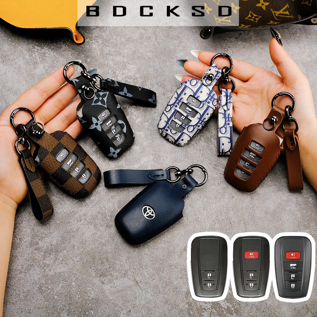 Bao da chìa khóa smartkey xe ô tô Toyota Corolla Cross Camry Altis 2022 mẫu mới khâu tay có tay cầm