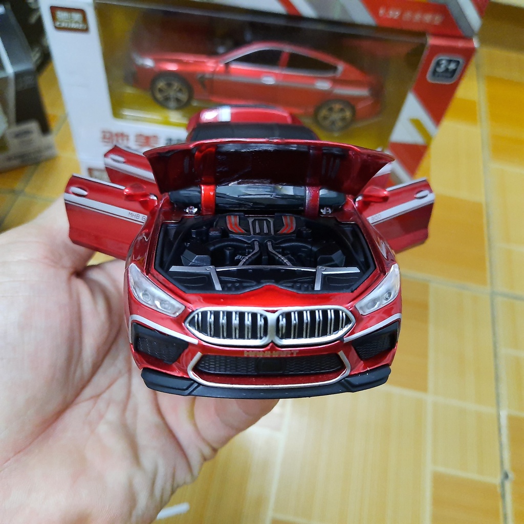 Xe ô tô BMW M8 đồ chơi trẻ em bằng kim loại có âm thanh và đèn xe mở các cửa mô hình tỉ lệ 1:32