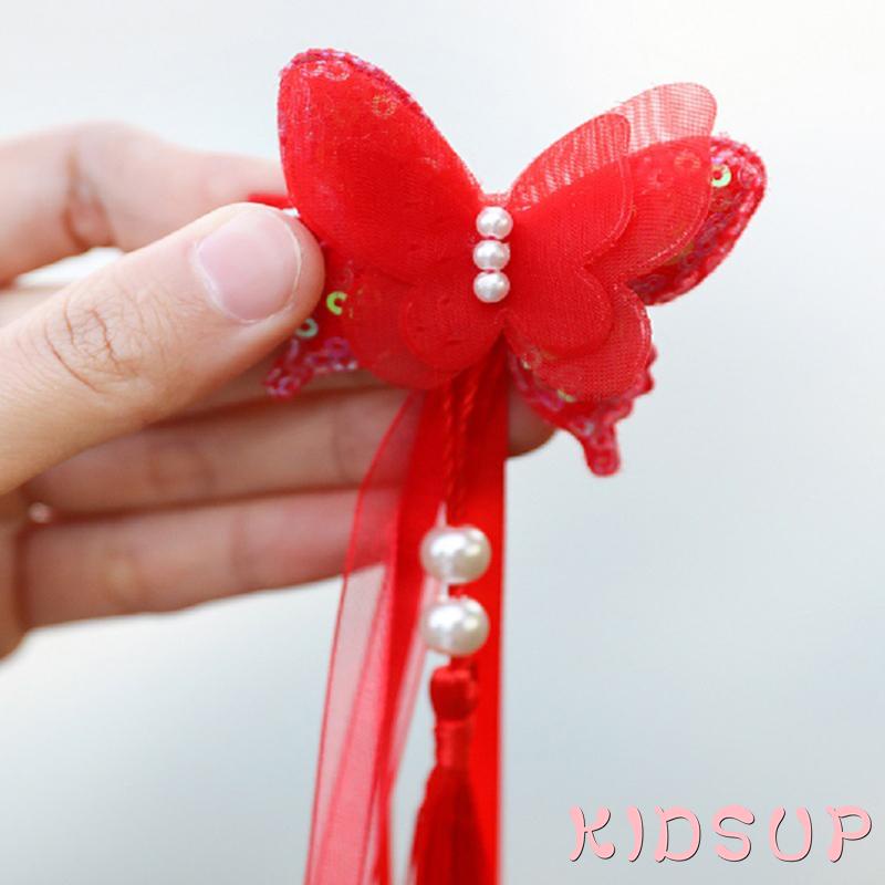 Kẹp tóc hình bươm bướm đính hạt phối tua rua dễ thương cho bé