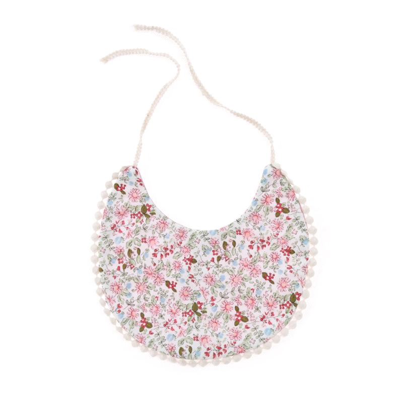 Yếm Ăn Bằng Cotton In Hoa Phối Tua Rua Cho Bé
