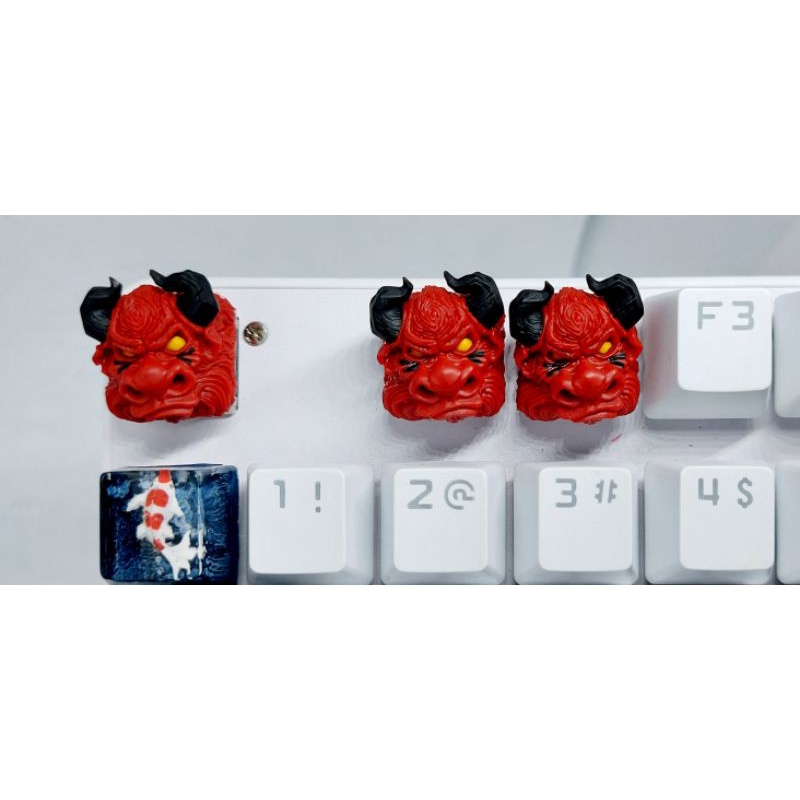 Keycap Bò Clone tone đỏ đậm đen trang trí bàn phím cơ.