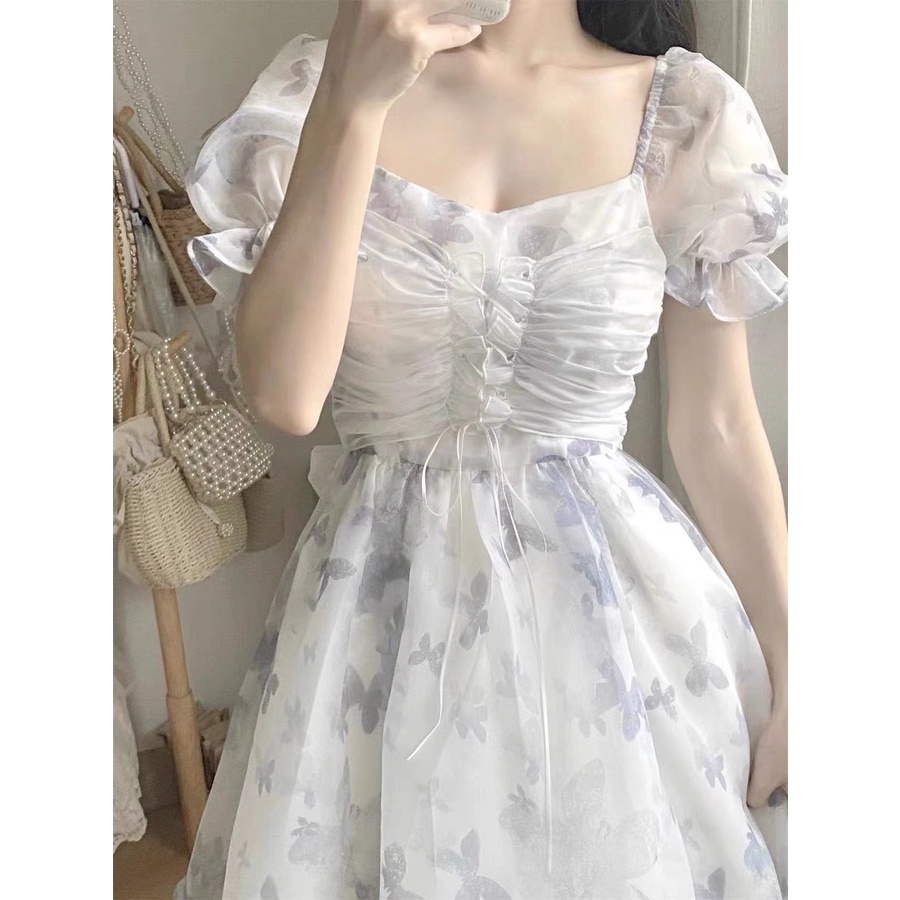 Đầm xinh đi tiệc, dạo phố hoa in nỗi thắt nơ sau
