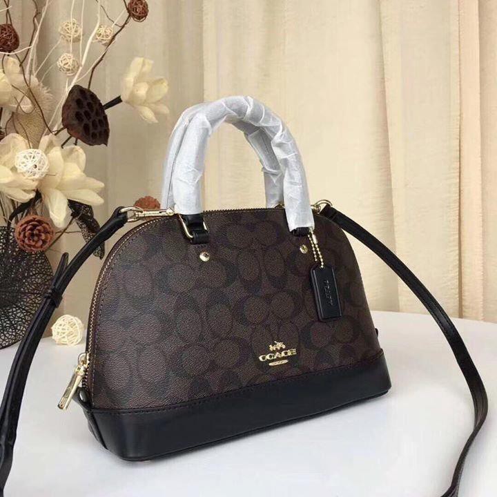 Túi xách Coach hến nâu đen đậm