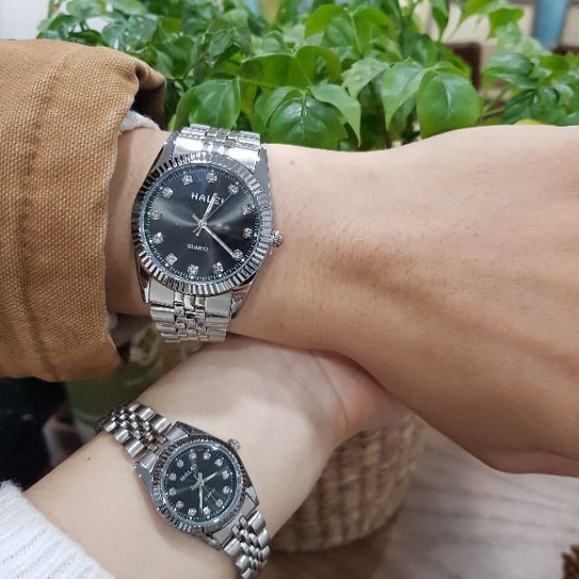 Đồng Hồ Cặp Nam Nữ Dây Kim Loại HL Mặt Đen Sang Trọng