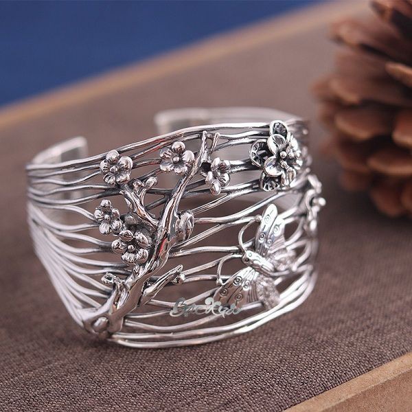 Vòng tay hoa mai cổ bạc nguyên chất