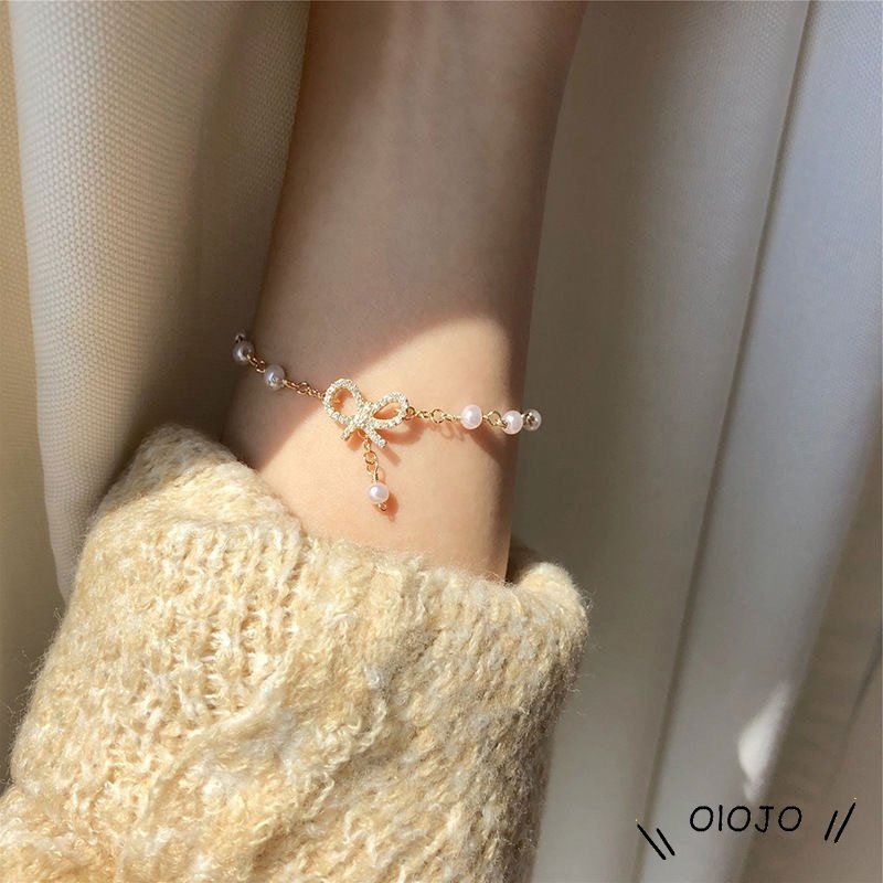🌼Vòng tay nữ xỏ ngọc trai giả phối mặt nơ thời trang