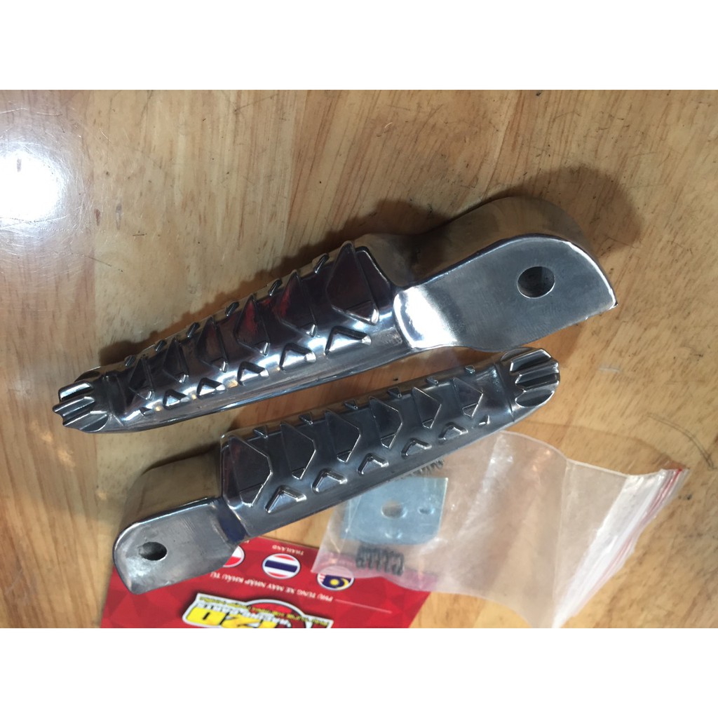 Gác chân nhôm sau xương cá raider-honda