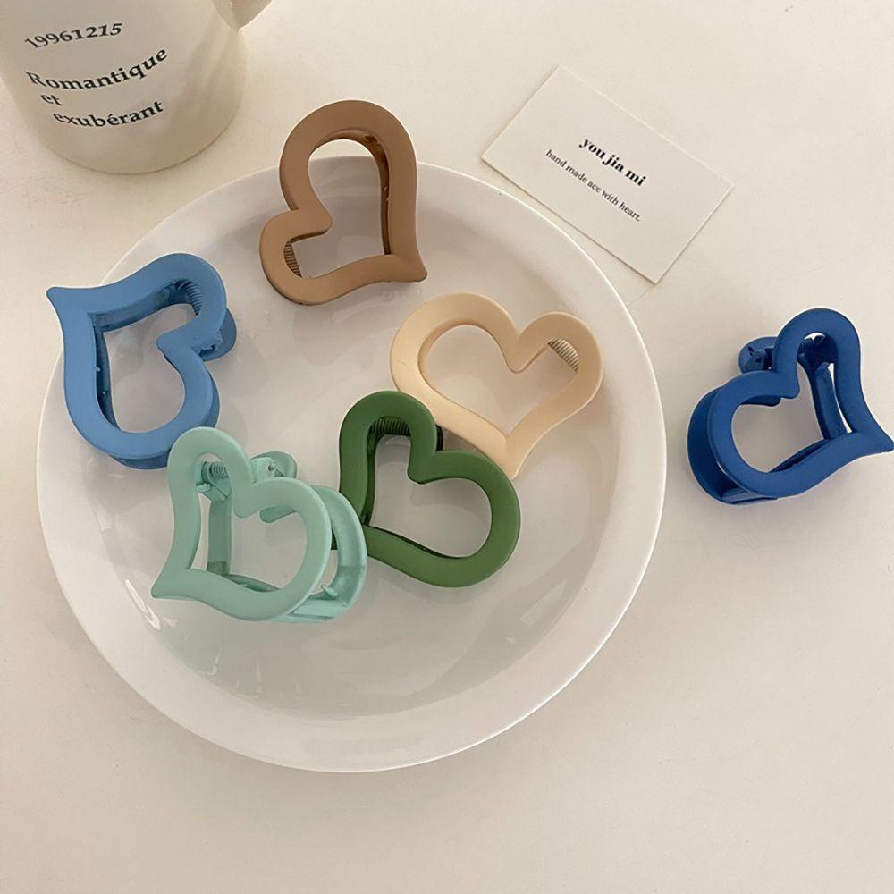 Kẹp Tóc Càng Cua Màu Kẹo Họa Tiết Trái Tim Rỗng Dễ Thương Cho Nữ