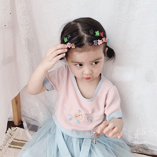 kẹp tóc hoa nhí cho bé