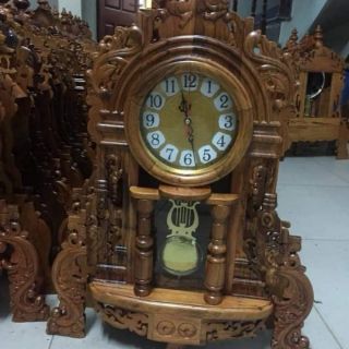 Đồng hồ gỗ mun cao65cm ngang 35cm