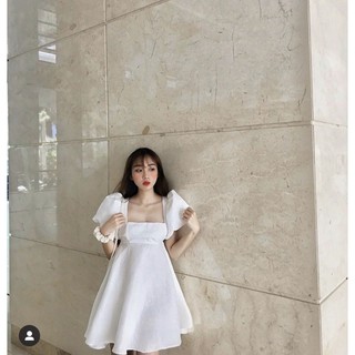 Đầm gấm hở nơ lưng về sẵn sll rồi ạ. siêu phẩm ạ