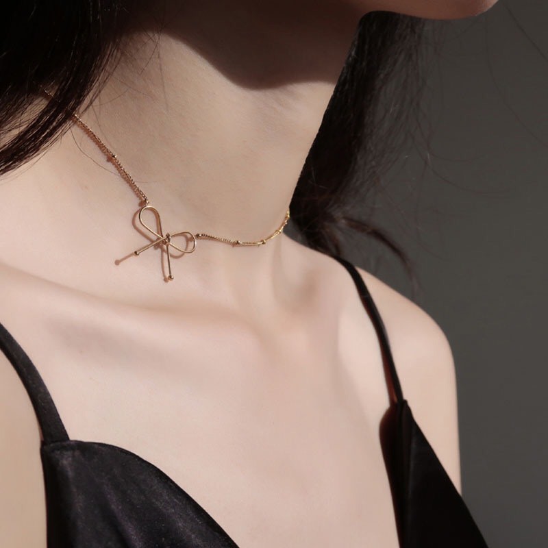 Chocker sợi mảnh quyến rũ họa tiết nơ lệch DCX76 Mayconner