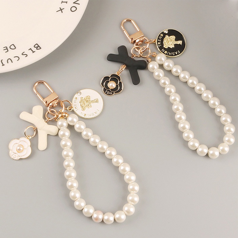 Móc khóa trang trí túi xách/điện thoại hình bông hoa và nơ phối chuỗi hạt ngọc trai nhân tạo tinh tế