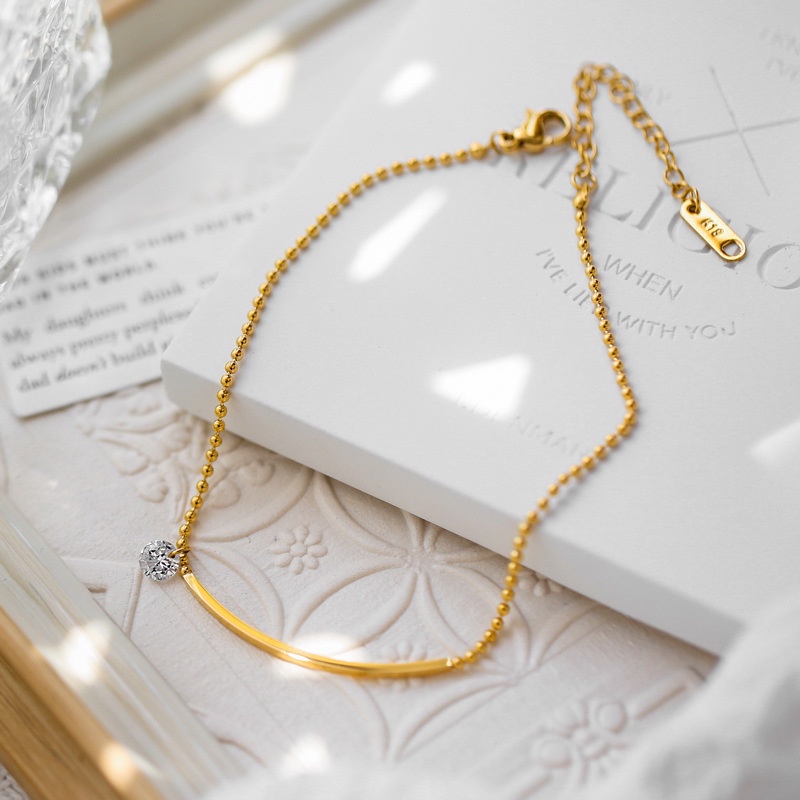 Lắc chân thép titan mạ vàng 18K mặt cười sang trọng chống thấm nước và mồ hôi phong cách Pháp sang trọng