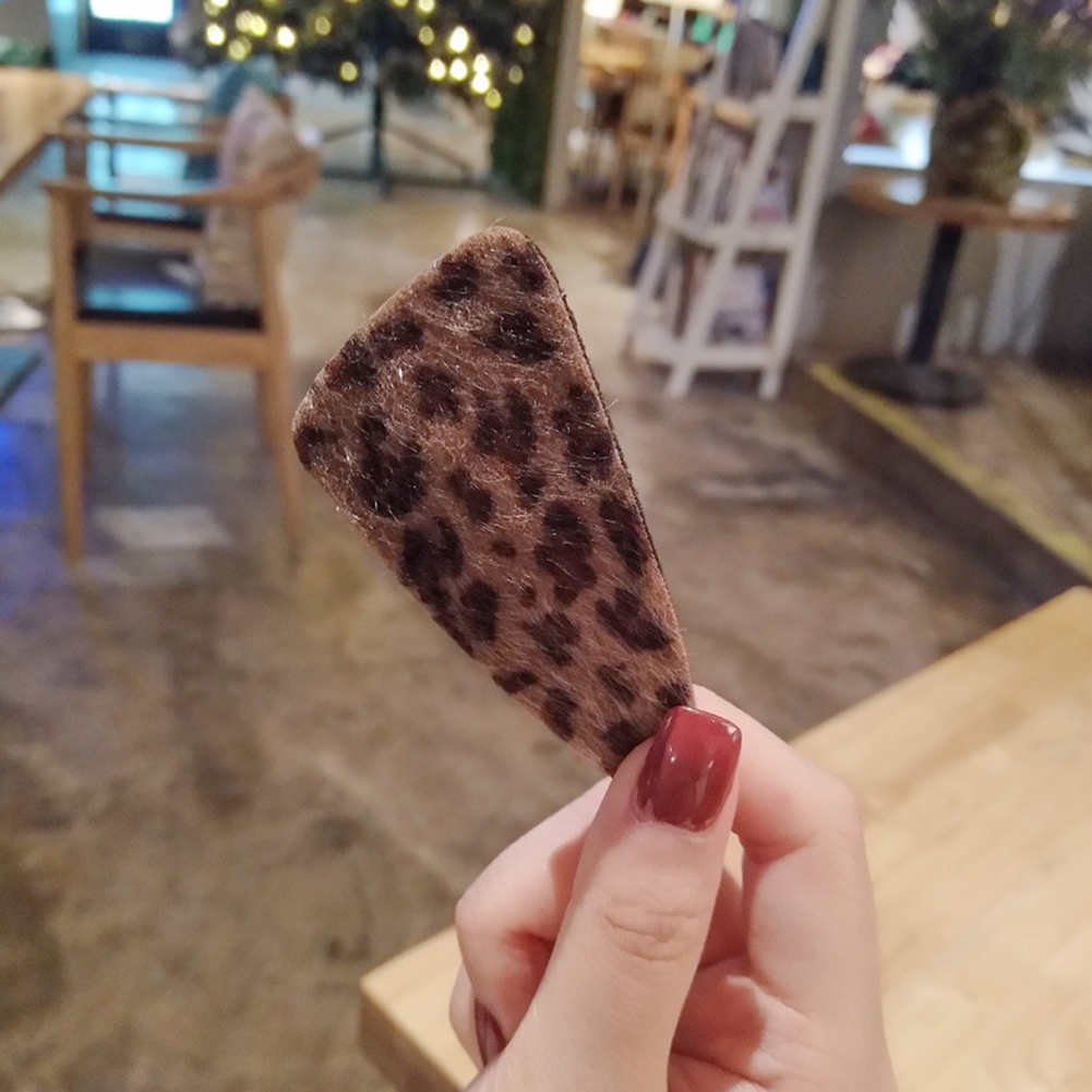 Kẹp tóc hình lông vũ thời trang