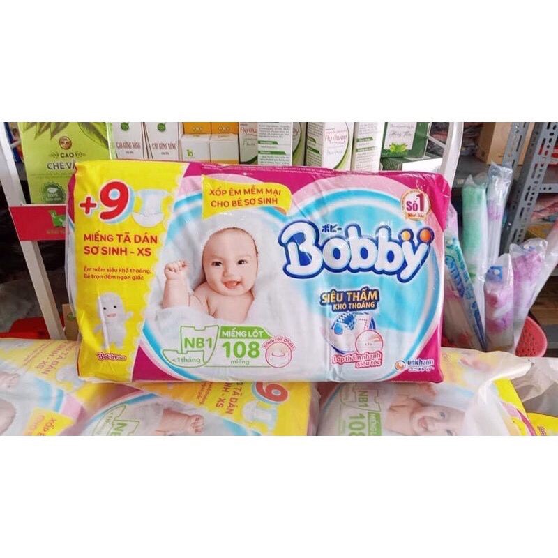 Miếng lót sơ sinh Bobby NB1 64/ NB1 108 miêng + 9 miếng tã dán cho bé