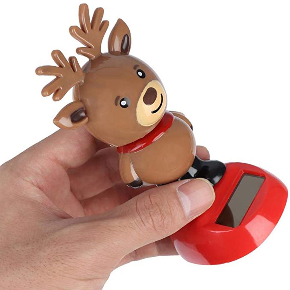 Búp bê người tuyết lắc đầu dùng năng lượng mặt trời trang trí xe hơi