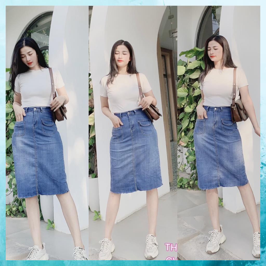 Chân váy jeans dáng dài, chân váy bò trơn lưng cao túi lệch 1 khuy. Mã V9135