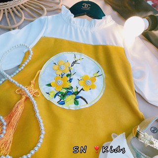 Áo dài thêu hoa mai cho bé
