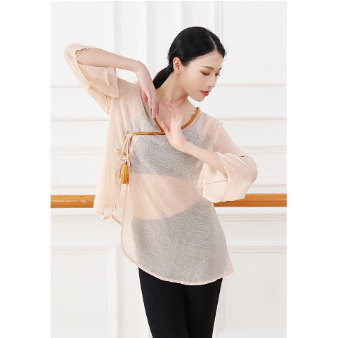 Áo vạt chéo đính tua rua