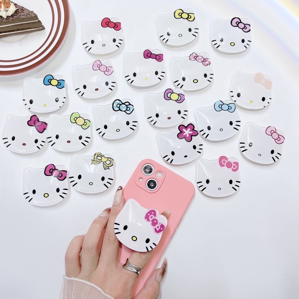 Giá Đỡ Điện Thoại Có Túi Khí Co Giãn Hình Hello Kitty Thông Dụng