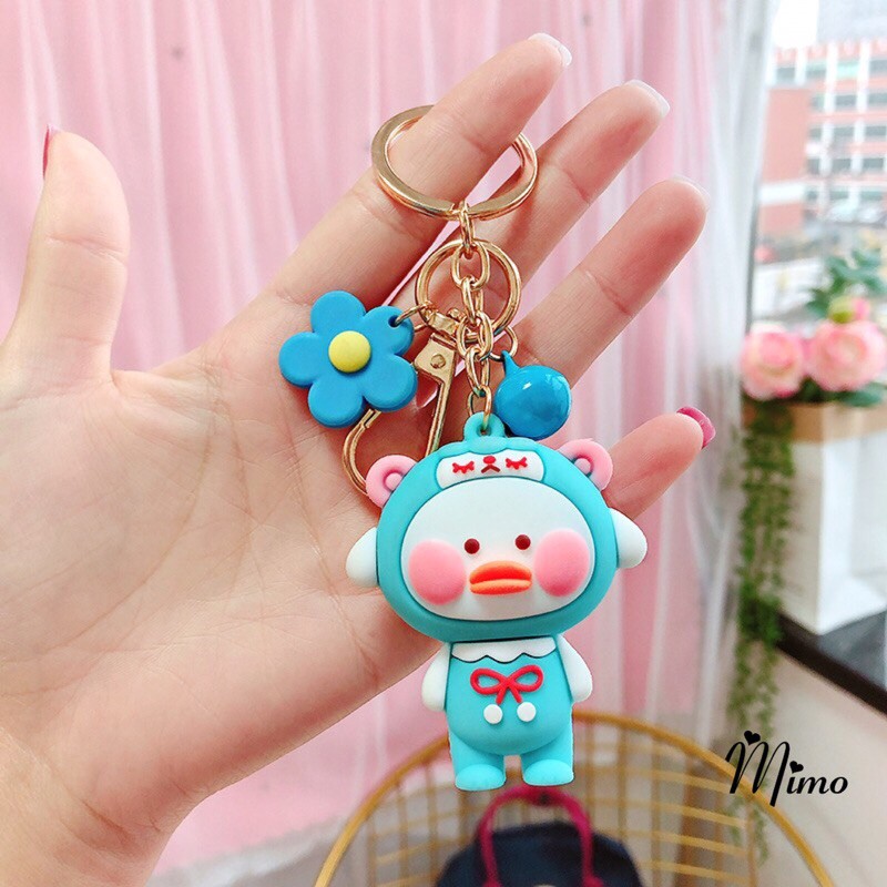 Móc khóa hình vịt môi tều kèm bông hoa và quả chuông mẫu mới cute đáng yêu 4 màu xinh xắn độc đáo lựa chọn