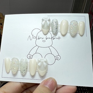 Nailbox trắng ngà đính nơ nhẹ nhàng