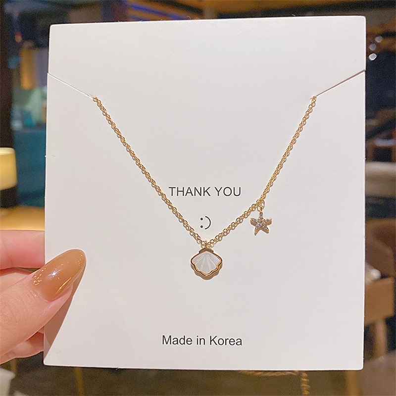 Dây chuyền thép titan mặt sao biển vỏ sò phát quang phong cách Nhật Hàn cho nữ