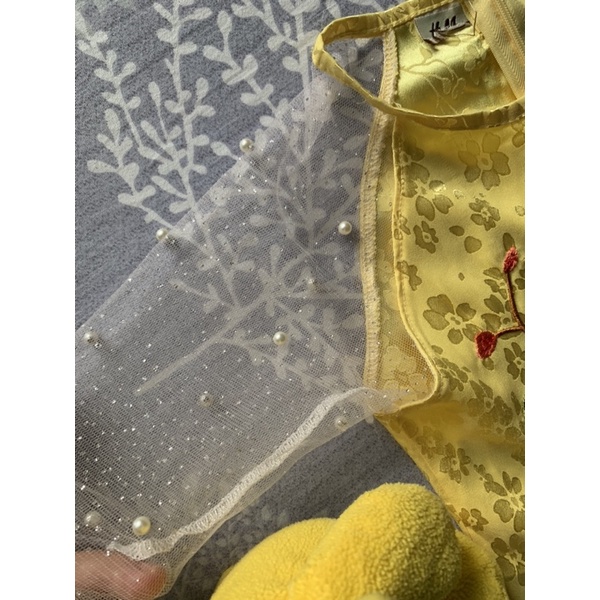 Áo dài gấm lụa hoa thêu cho bé