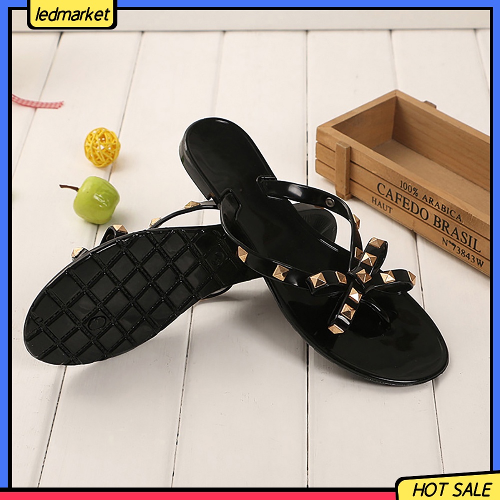 Dép đi biển phối nơ và đinh thời trang mùa hè dành cho nữ