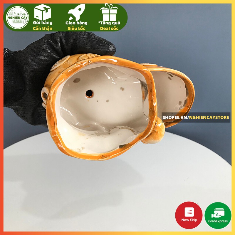 Chậu gốm sứ ông thần tài trồng cây cảnh