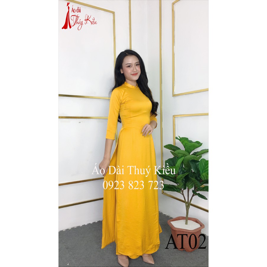 Áo dài Thúy Kiều trơn lụa Tây Thi cổ tàu màu vàng AT02