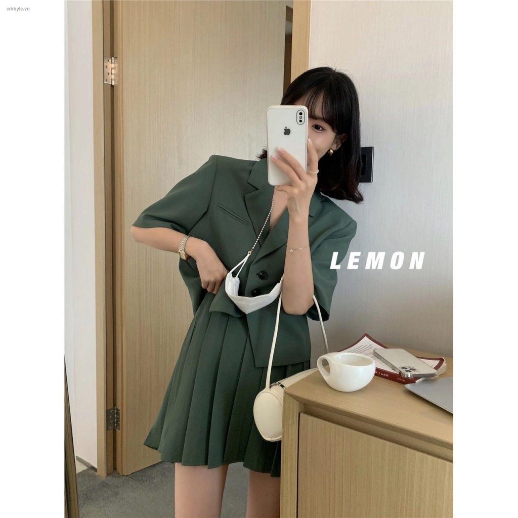 Set áo thun ngắn tay và chân váy xếp ly lưng cao thời trang phương Tây cho nữ 2021