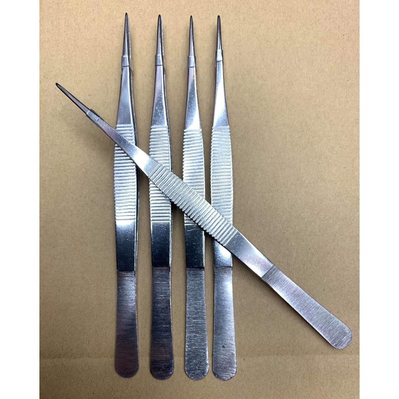 1 nhíp dài 20cm bằng thép không gỉ.