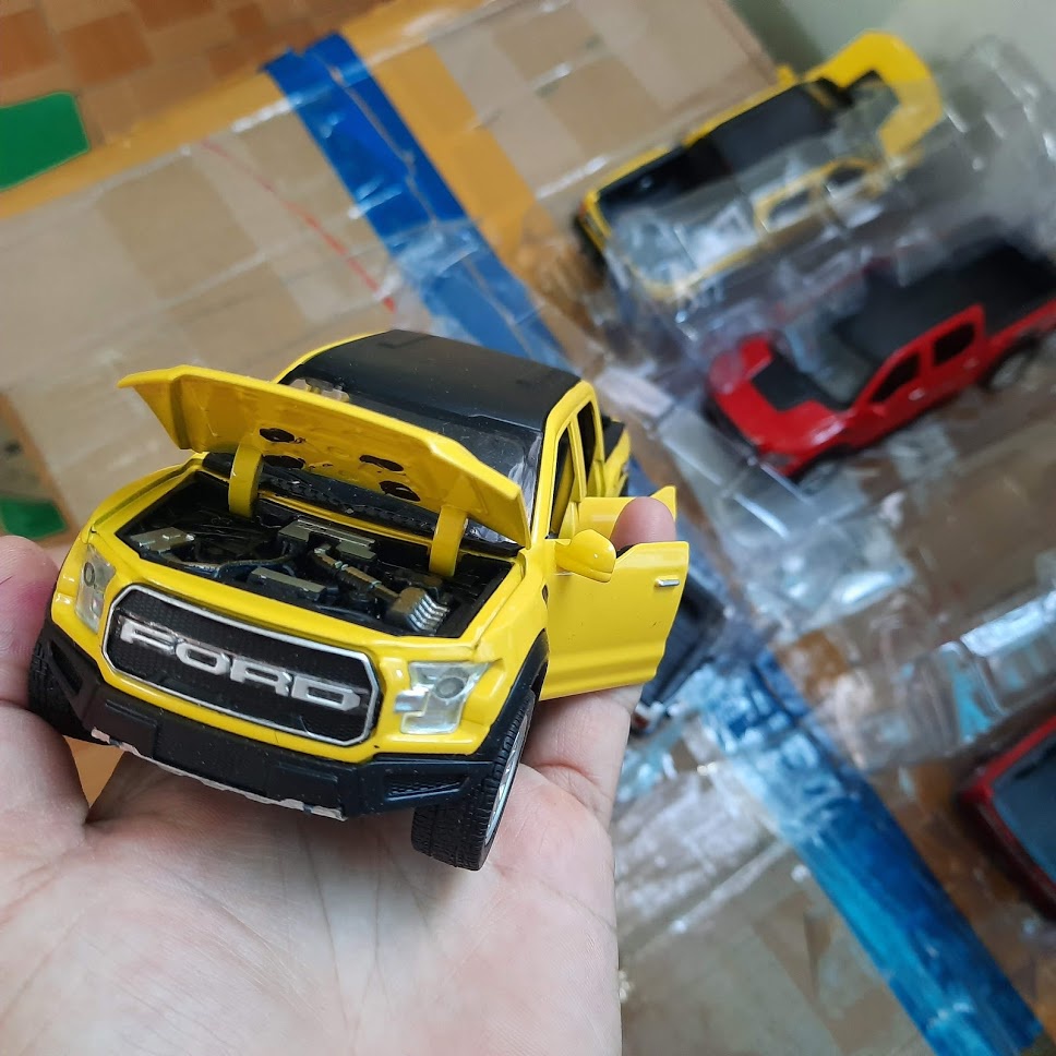 Xe mô hình ô tô Ford Ranger offroad 4x4 đồ chơi trẻ em tỉ lệ 1:32 xe ô tô làm bằng kim loại có đèn và âm thanh