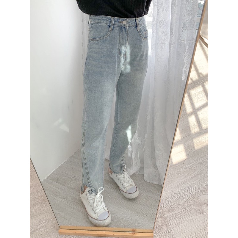 Quần jeans  xẻ vạt ống suông