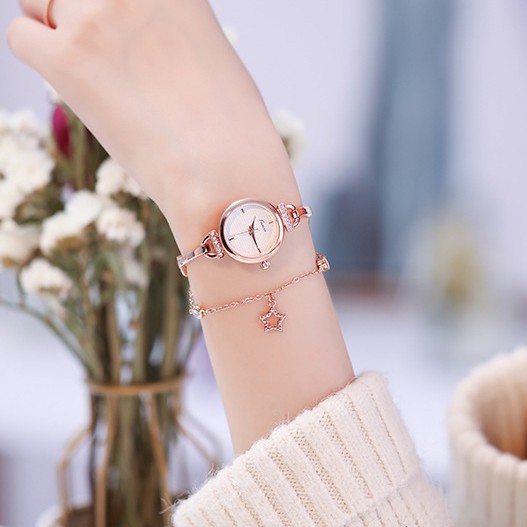 Đồng hồ lắc tay nữ Kimio 6400 dây rút mặt tròn kim loại đính kèm ngôi sao cực xinh | BigBuy360 - bigbuy360.vn