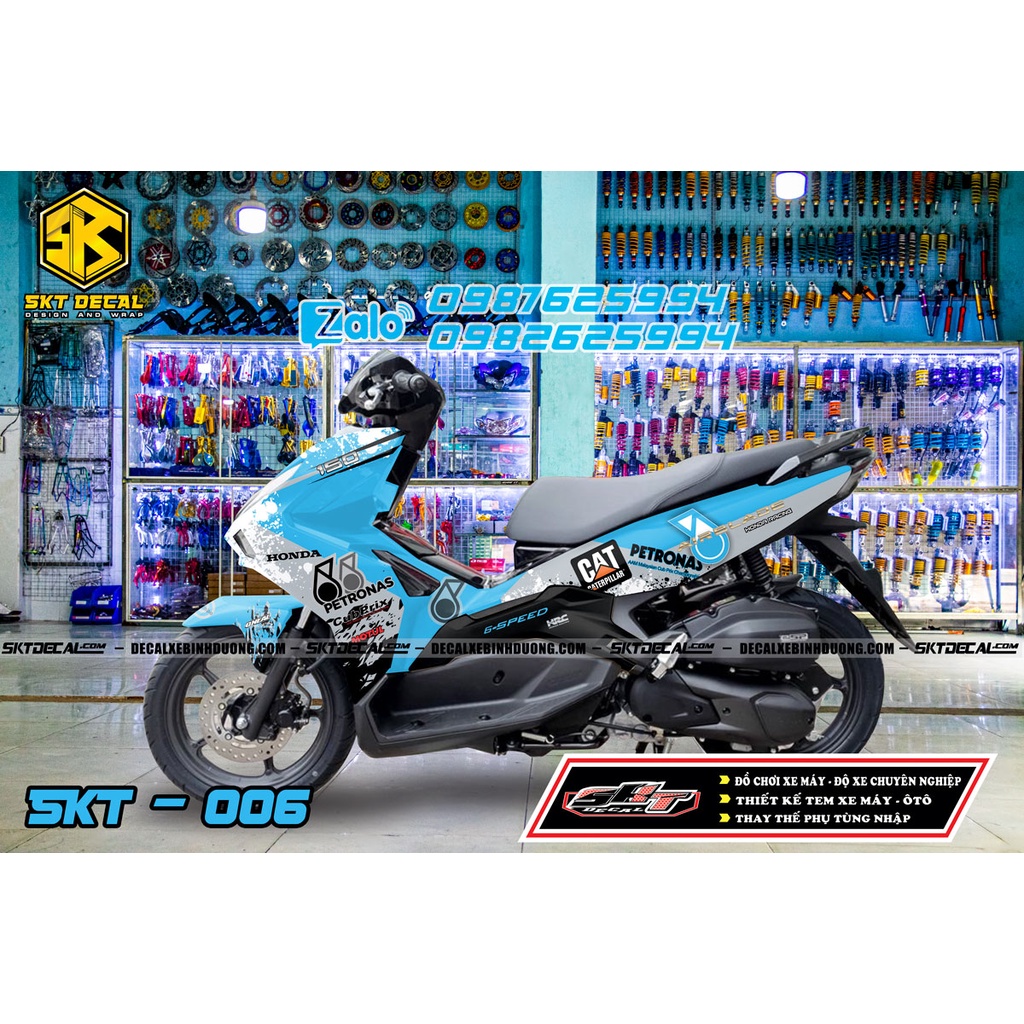 tem trùm xe airblade xanh bạc petronas