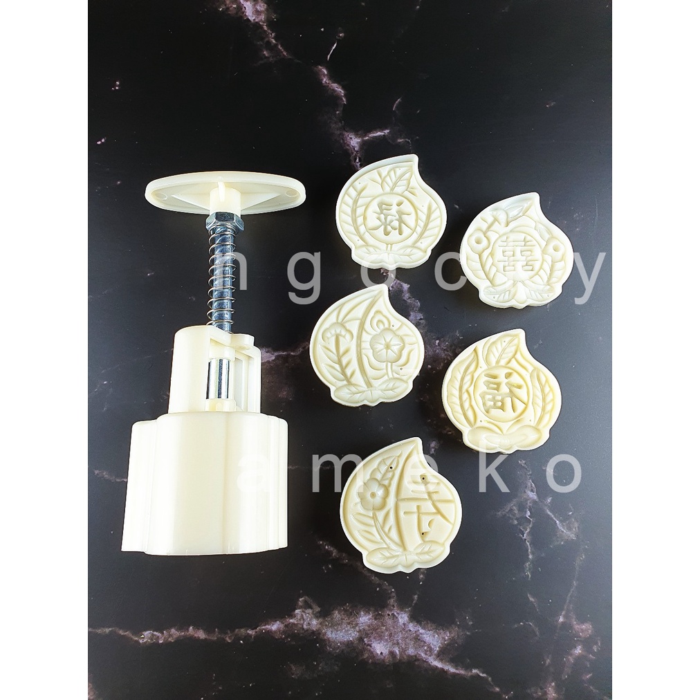 NQ50-024- KHUÔN LÒ XO BÁNH TRUNG THU / BÁNH DỨA  HÌNH QUẢ ĐÀO 50G