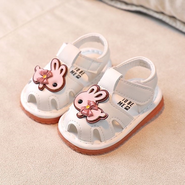 Sandal tập đi cho bé gái họa tiết thỏ đế mềm chống trơn trượt có còi tít tít ( 003)