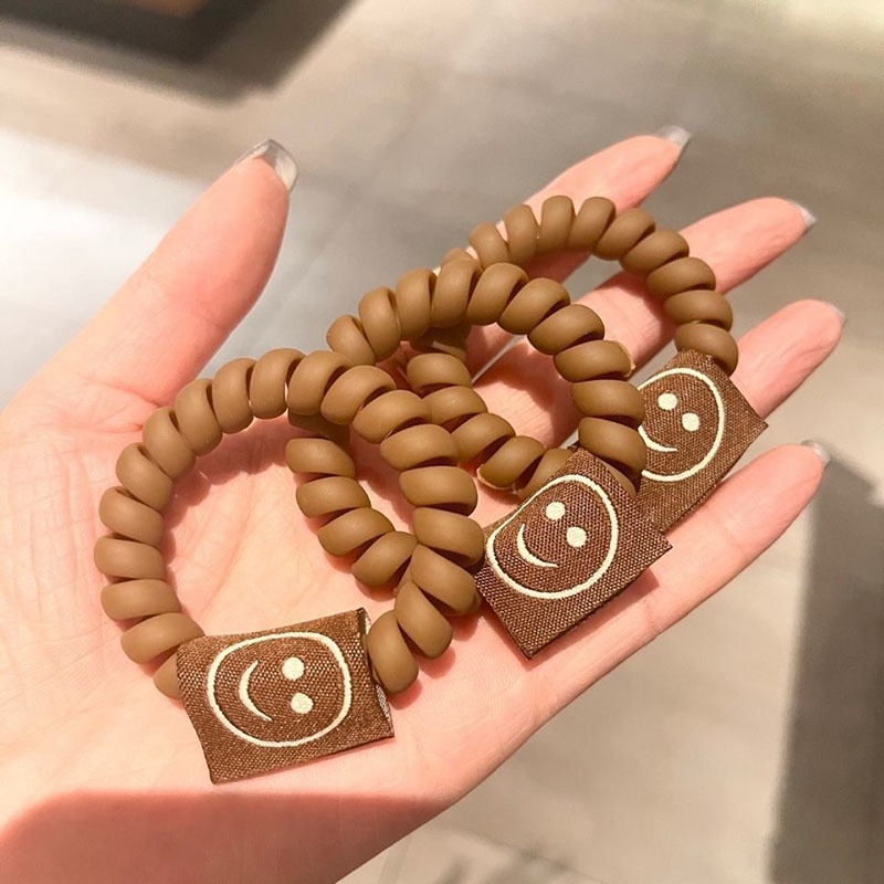 Dây buộc tóc cao su kiểu đường dây điện thoại với mặt cười thời trang phong cách Hàn Quốc dành cho nữ