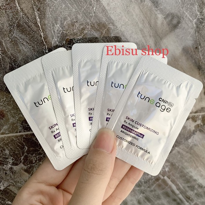 1 Gói tinh chất dưỡng trắng nâng cơ CNP Skin Customizing Regenerating Brightening.