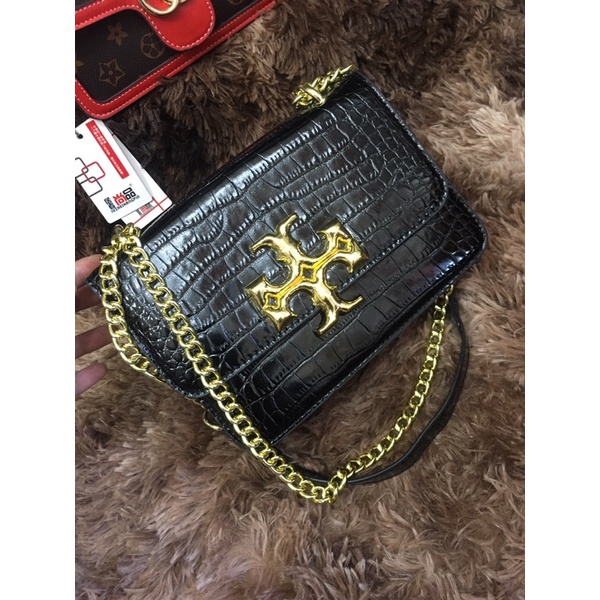 túi đeo chéo nữ xích phối da TORYBURCH