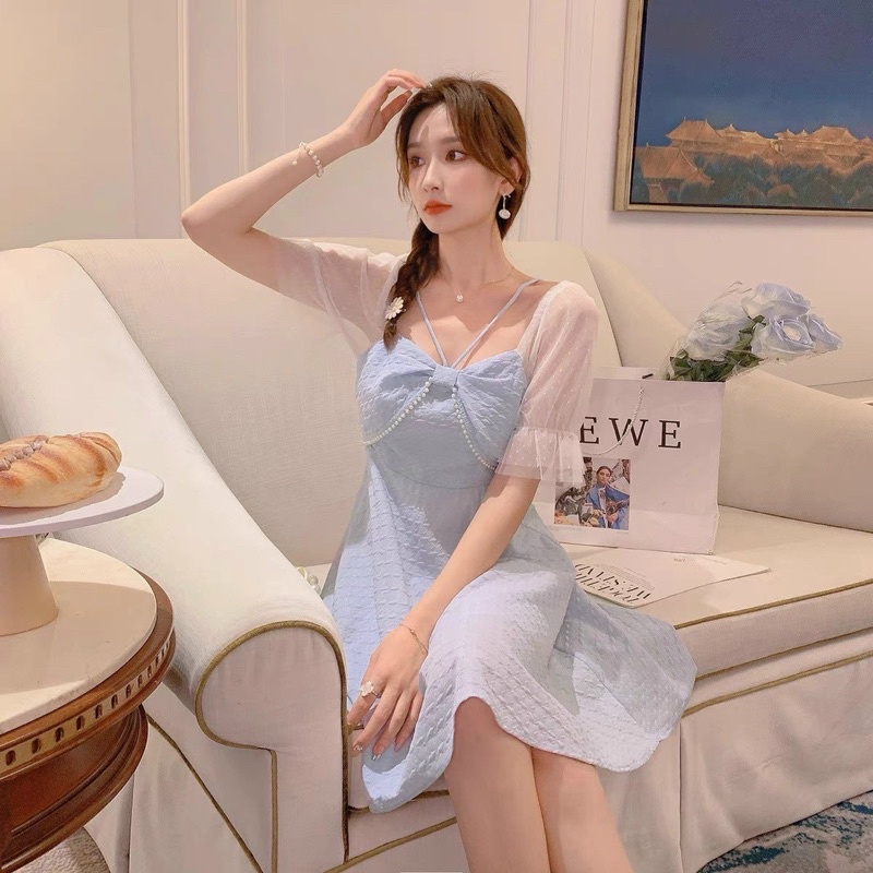 ĐẦM XANH NƠ NGỰC DÂY CHÉO CỔ TAY PHỐI KEM