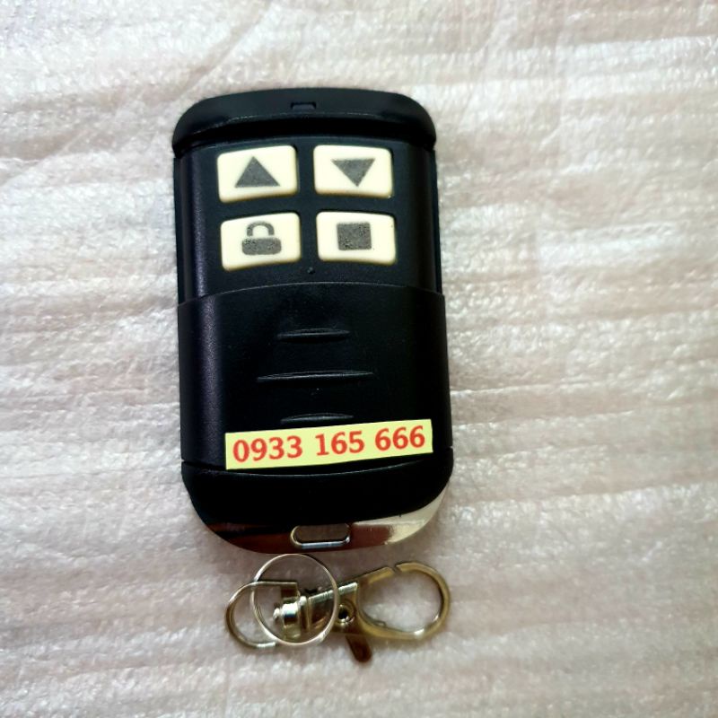 Điều khiển cửa cuốn 8 mã gạt 433 chống nước- có hướng dẫn cài đặt